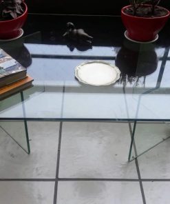Mesa de centro con 2 bases de vidrio y bronce